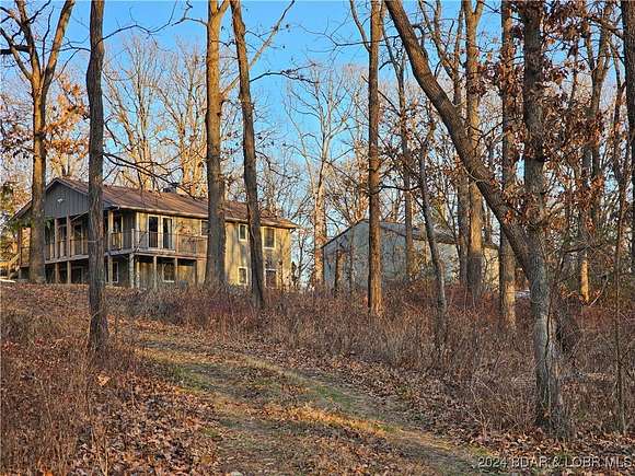 5 Acres of Residential Land with Home for Sale in Eldon, Missouri