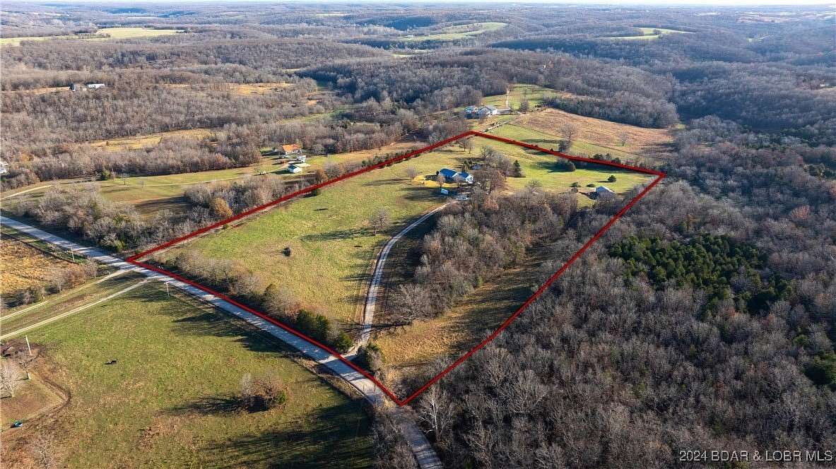 20 Acres of Agricultural Land with Home for Sale in Camdenton, Missouri