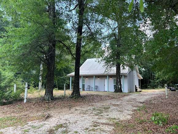 25.3 Acres of Recreational Land with Home for Sale in Lumberton, Mississippi