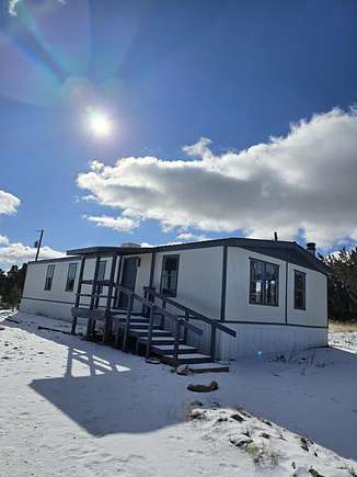 2.5 Acres of Residential Land with Home for Sale in Edgewood, New Mexico