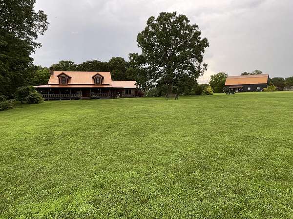 59.1 Acres of Land with Home for Sale in Dora, Missouri