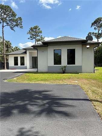 2.5 Acres of Residential Land with Home for Sale in Naples, Florida