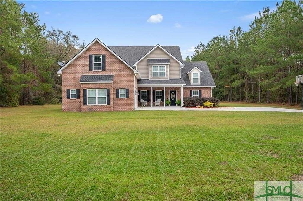 5 Acres of Residential Land with Home for Sale in Richmond Hill, Georgia