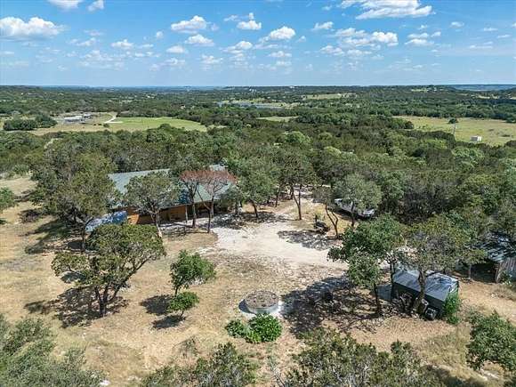 11.2 Acres of Land with Home for Sale in Glen Rose, Texas