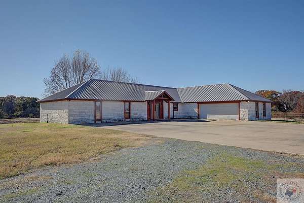 100 Acres of Agricultural Land with Home for Sale in New Boston, Texas