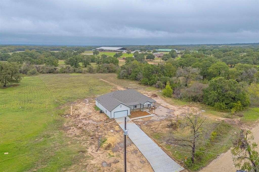 2 Acres of Residential Land with Home for Sale in Poolville, Texas