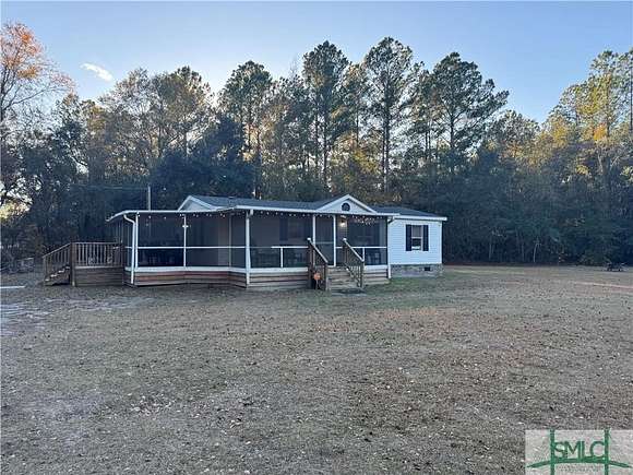 5 Acres of Residential Land with Home for Sale in Ellabell, Georgia