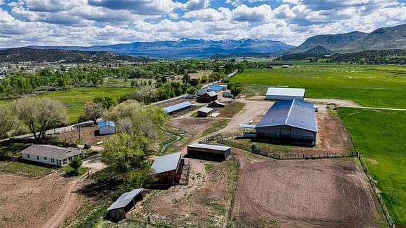 200 Acres of Agricultural Land with Home for Sale in Mancos, Colorado