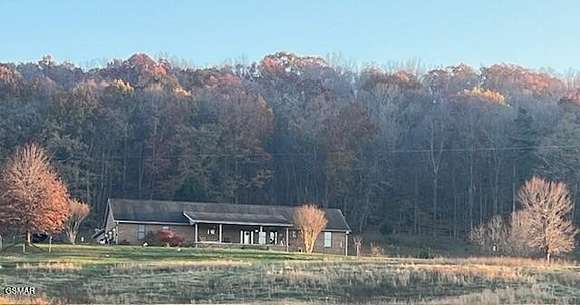 5.54 Acres of Residential Land with Home for Sale in Kodak, Tennessee