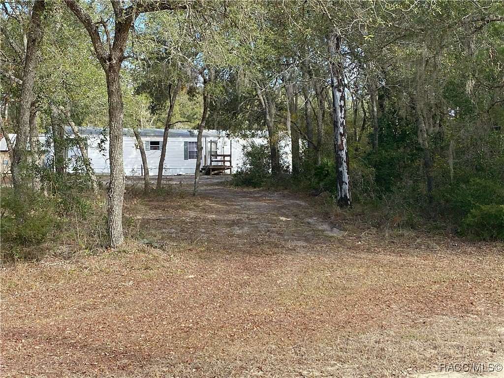 2.64 Acres of Residential Land with Home for Sale in Dunnellon, Florida