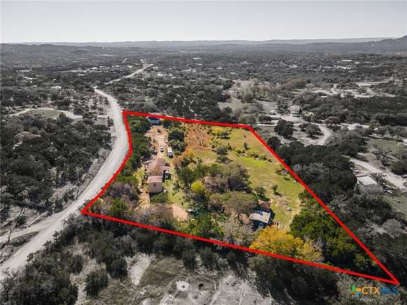 5.1 Acres of Residential Land with Home for Sale in Pipe Creek, Texas