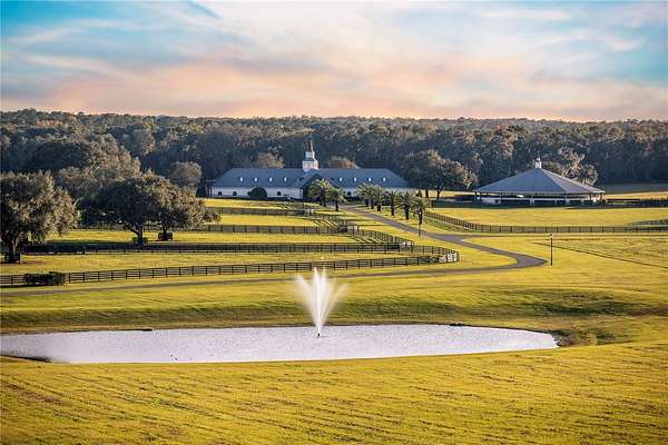 210 Acres of Agricultural Land with Home for Sale in Micanopy, Florida