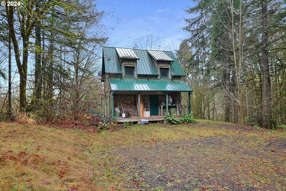 10.15 Acres of Recreational Land with Home for Sale in Noti, Oregon