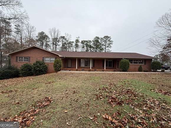 4.01 Acres of Residential Land with Home for Sale in Oakwood, Georgia