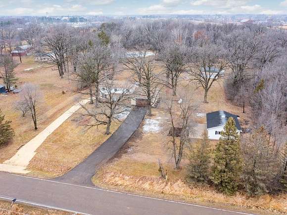 7.57 Acres of Residential Land with Home for Sale in Milaca, Minnesota