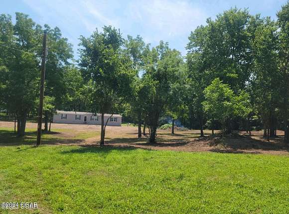 2 Acres of Residential Land with Home for Sale in Carthage, Missouri