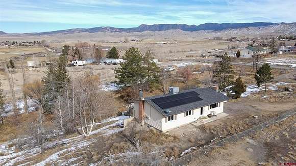 2.16 Acres of Residential Land with Home for Sale in Montrose, Colorado