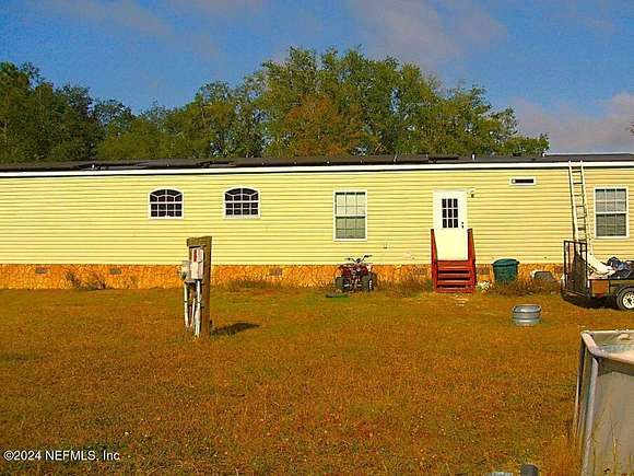 24.5 Acres of Land with Home for Sale in Lawtey, Florida