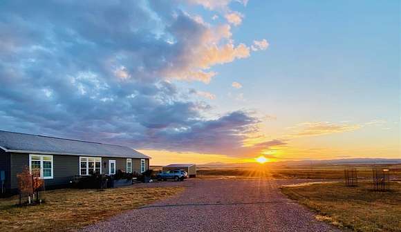 37.1 Acres of Agricultural Land with Home for Sale in Sundance, Wyoming