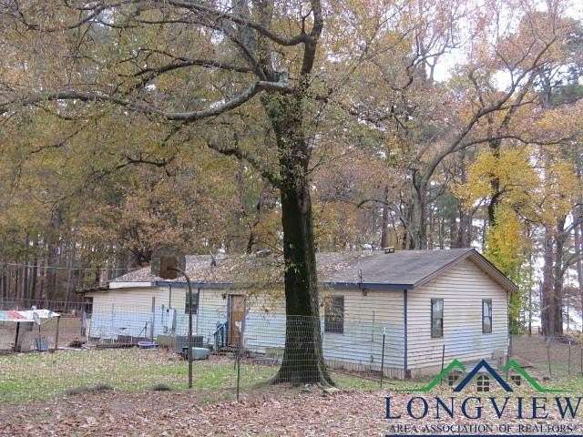 0.215 Acres of Residential Land with Home for Sale in Avinger, Texas