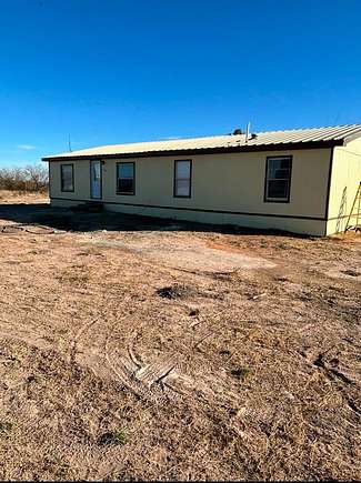 3 Acres of Residential Land with Home for Sale in Monahans, Texas