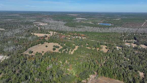 74 Acres of Recreational Land with Home for Sale in Altha, Florida