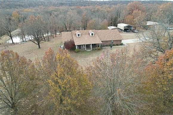 73 Acres of Land with Home for Sale in Pocola, Oklahoma