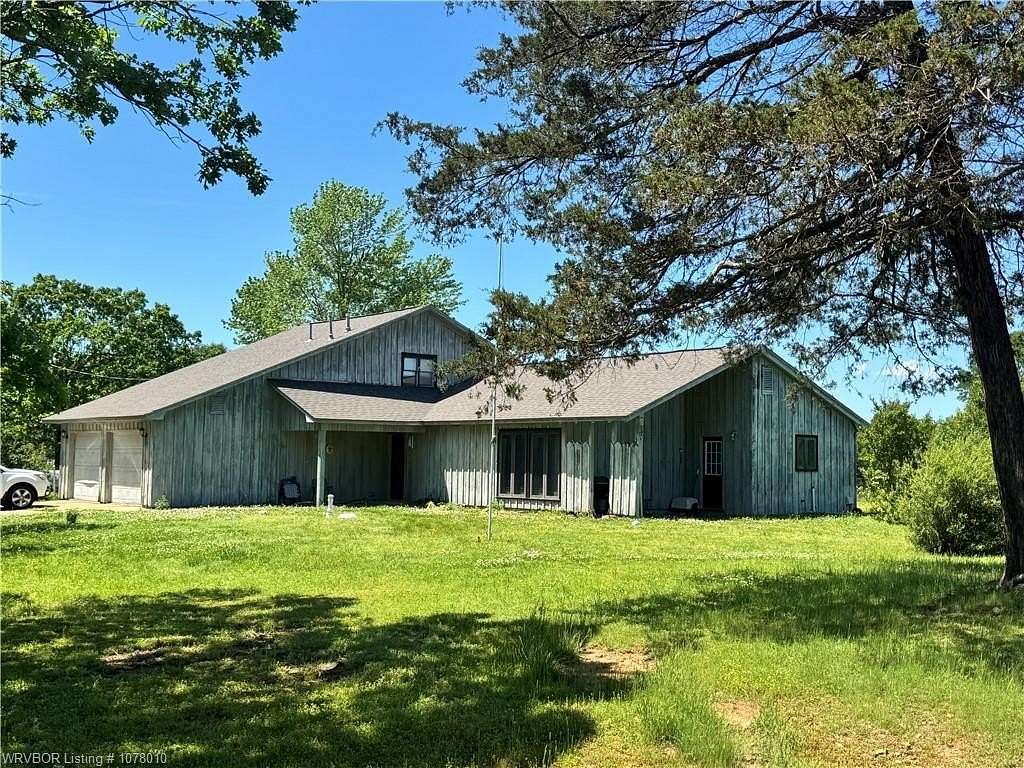 10 Acres of Land with Home for Sale in Howe, Oklahoma