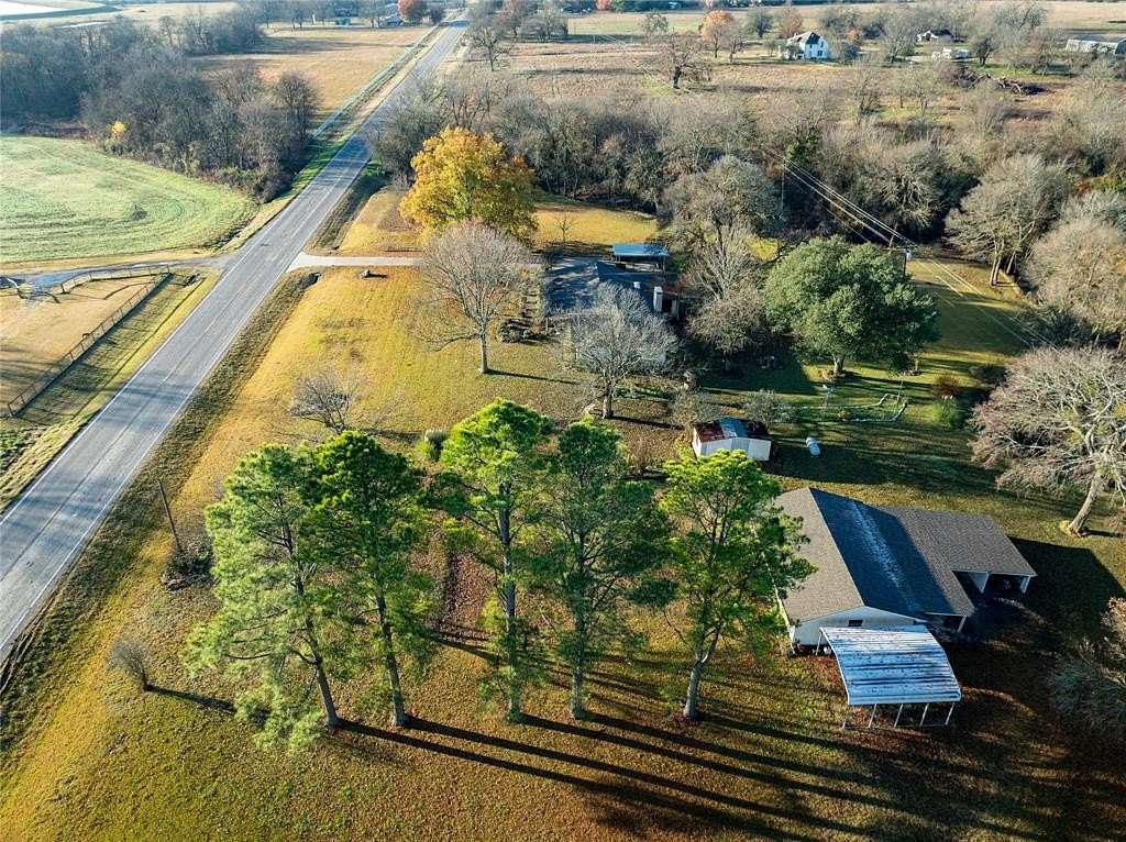 3.31 Acres of Residential Land with Home for Sale in Clarksville, Texas