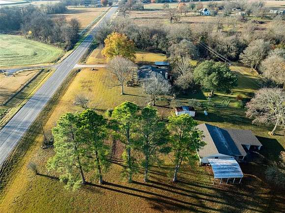 3.31 Acres of Residential Land with Home for Sale in Clarksville, Texas