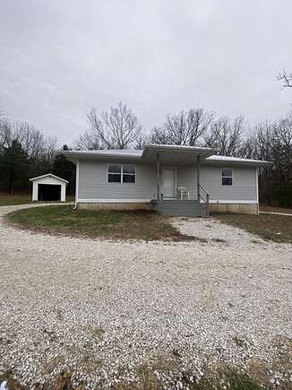 30 Acres of Land with Home for Sale in Flemington, Missouri