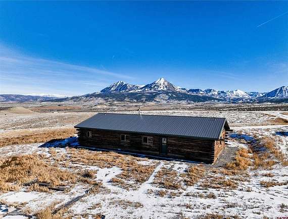 36.478 Acres of Recreational Land with Home for Sale in Hotchkiss, Colorado