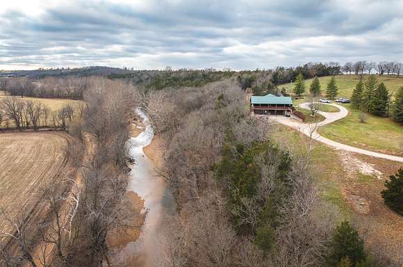 13 Acres of Recreational Land with Home for Sale in Meta, Missouri