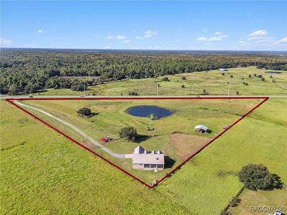 10.52 Acres of Land with Home for Sale in Lake Panasoffkee, Florida