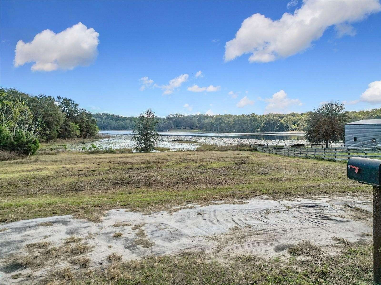 10.5 Acres of Recreational Land with Home for Sale in Lady Lake, Florida