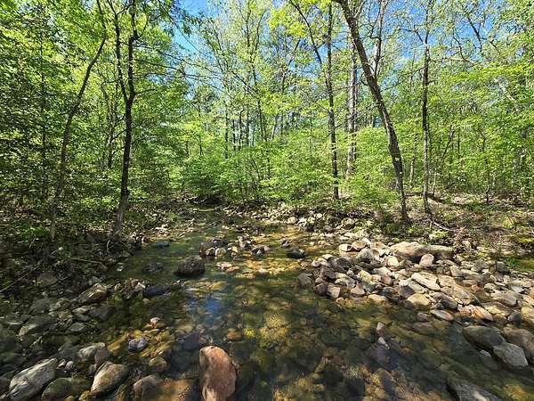 7.66 Acres of Land for Sale in Big Cedar, Oklahoma