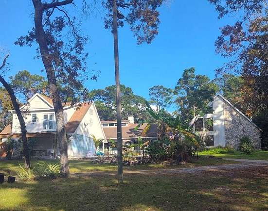 2.21 Acres of Residential Land with Home for Sale in Longwood, Florida