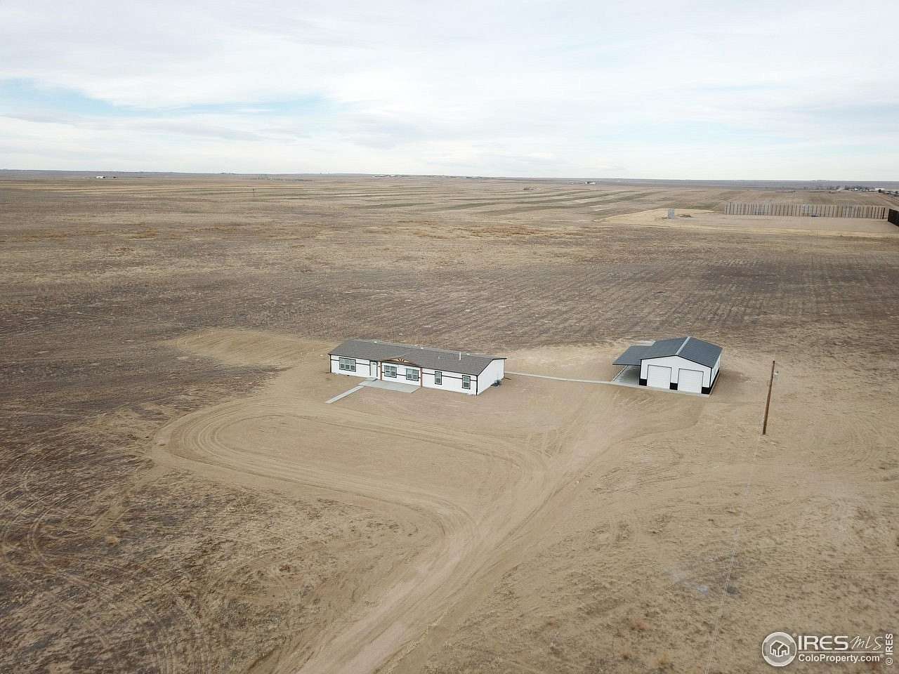 39 Acres of Land with Home for Sale in Briggsdale, Colorado