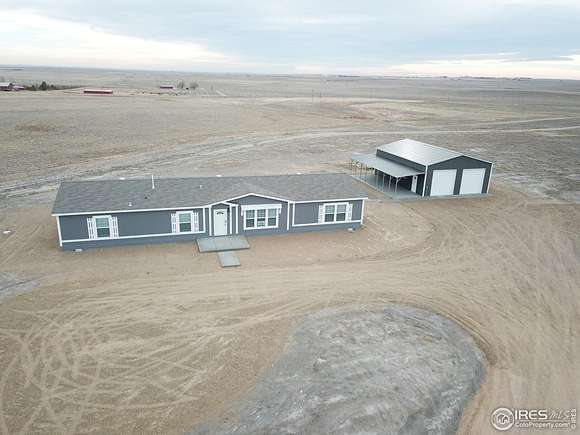 40 Acres of Land with Home for Sale in Briggsdale, Colorado