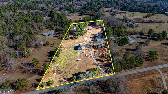 6.38 Acres of Residential Land with Home for Sale in Loganville, Georgia