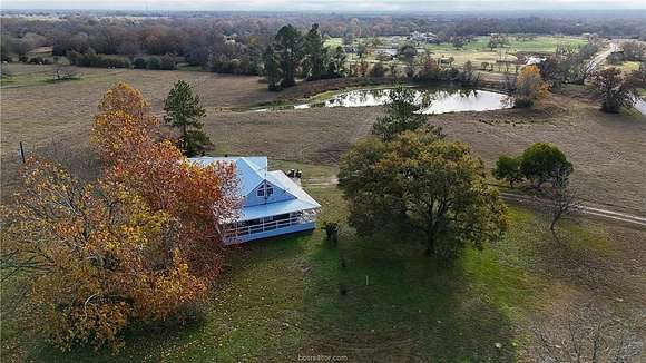 7.4 Acres of Residential Land with Home for Sale in Bryan, Texas