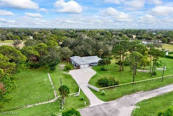 5.019 Acres of Land with Home for Sale in Alva, Florida