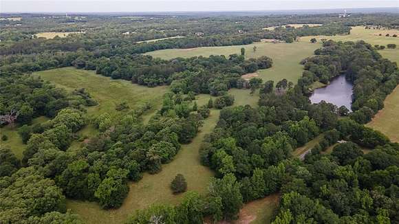 150 Acres of Agricultural Land with Home for Sale in Lindale, Texas