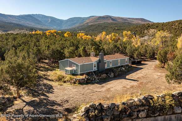 39.75 Acres of Recreational Land with Home for Sale in Rifle, Colorado