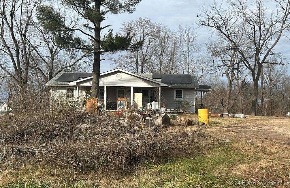 4.7 Acres of Residential Land with Home for Sale in Eldon, Missouri