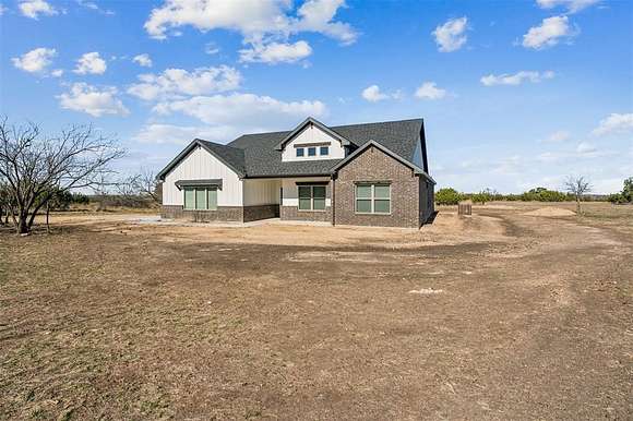 2.083 Acres of Residential Land with Home for Sale in Lipan, Texas