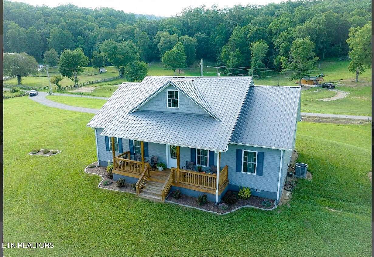 5.62 Acres of Residential Land with Home for Sale in Pioneer, Tennessee