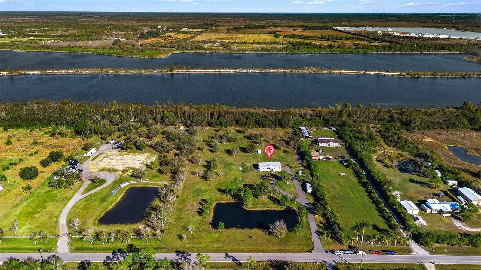 5 Acres of Land with Home for Sale in Punta Gorda, Florida