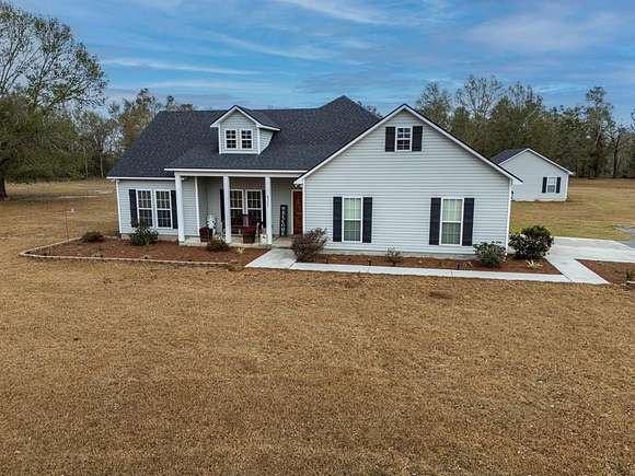 10.06 Acres of Land with Home for Sale in Naylor, Georgia