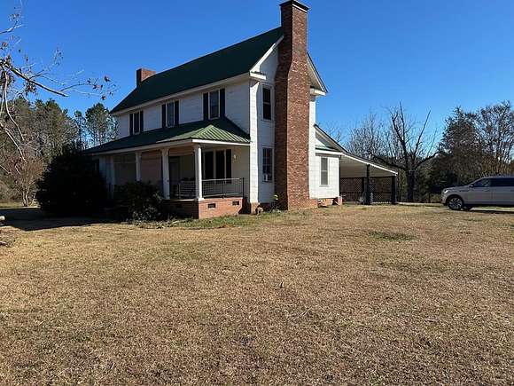 10.89 Acres of Land with Home for Sale in Donalds, South Carolina